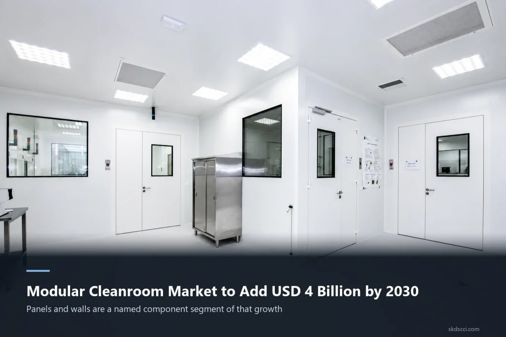 White modular cleanroom panels on the walls and ceiling, with panel doors, observation windows and ceiling HEPA filters